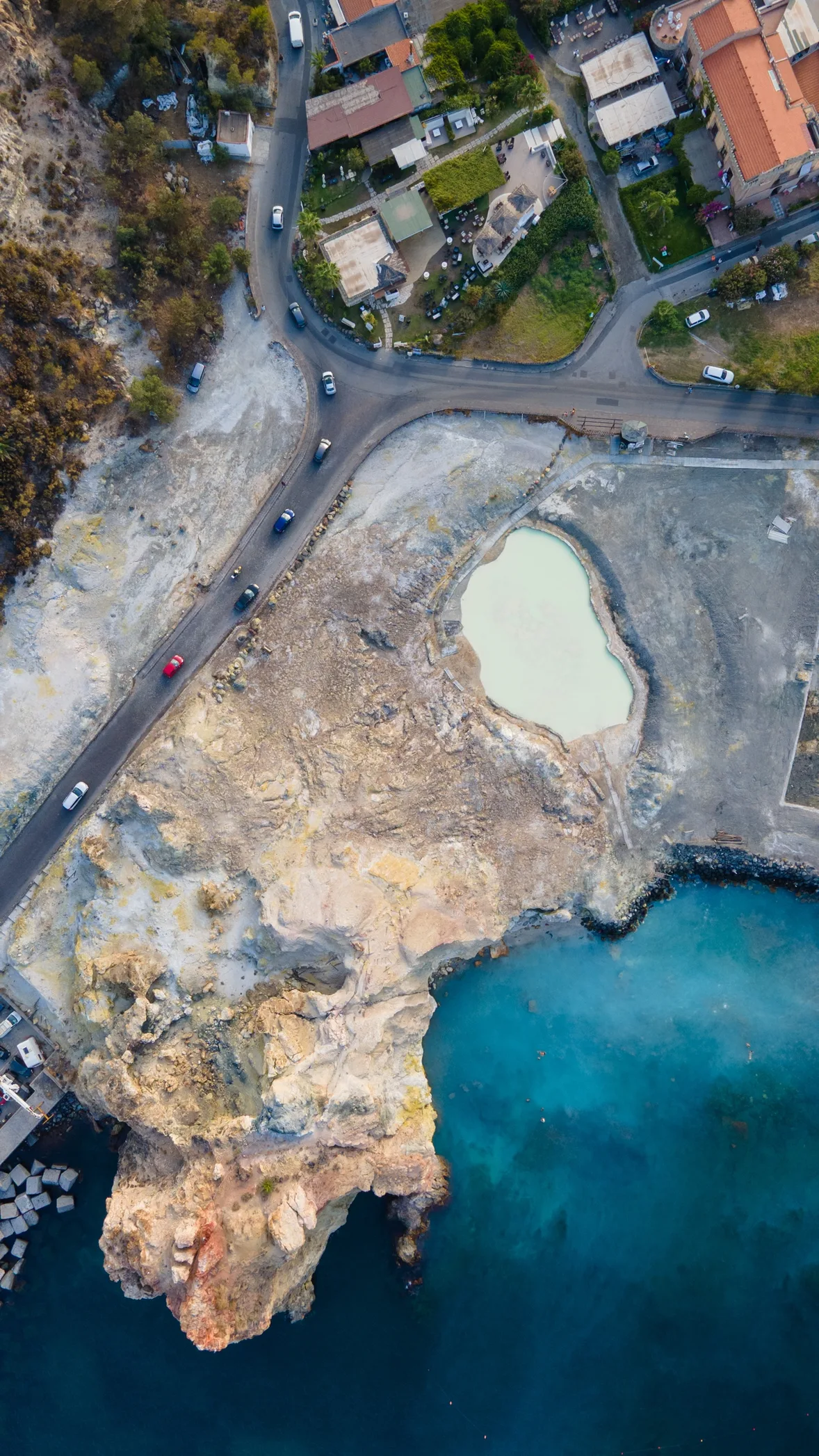 Aerial view of the Vulcano mud bath and the Faraglione at Porto Levante